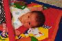 Malcolm on Activity Mat.jpg